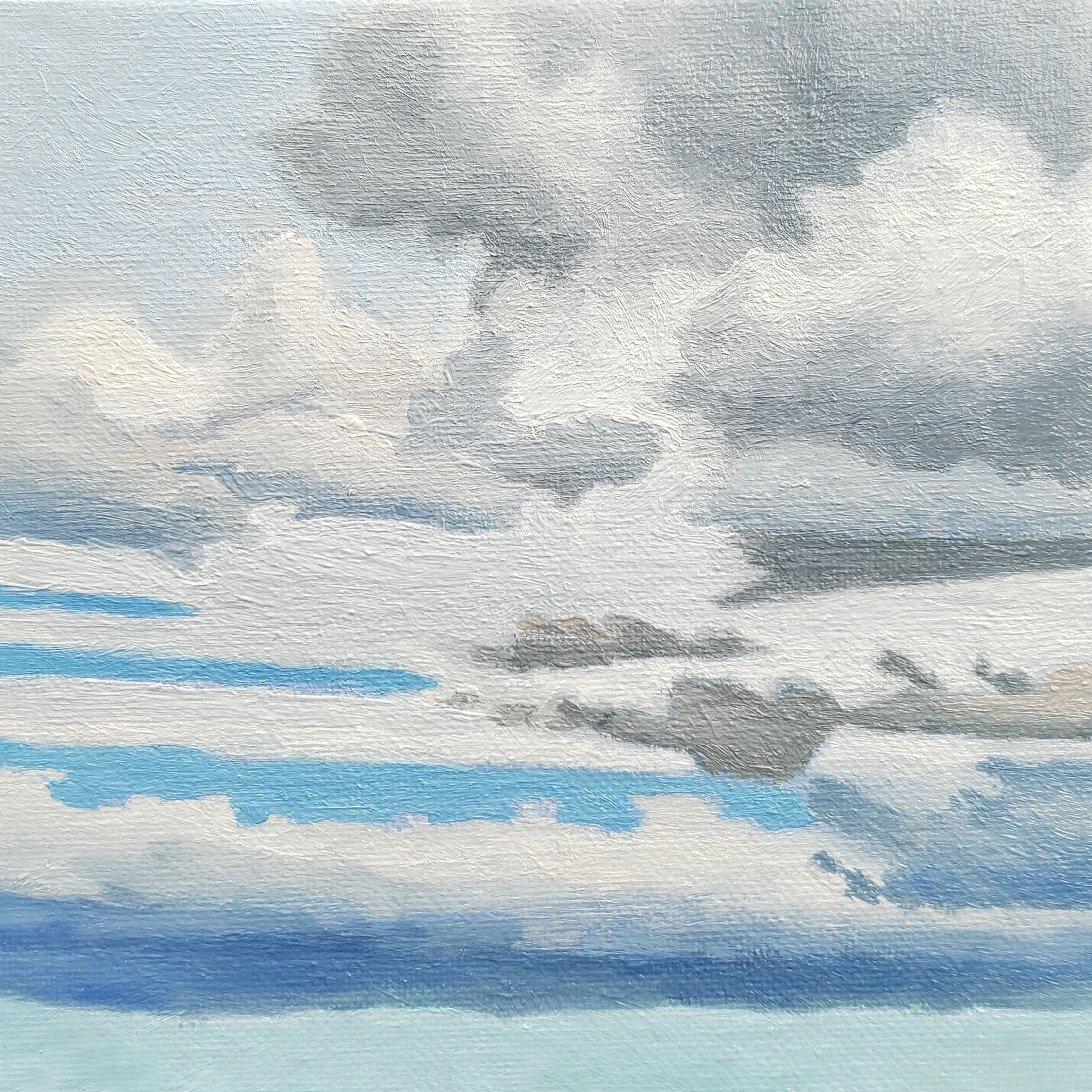 cropped view of a variety of overlapping cloud shapes