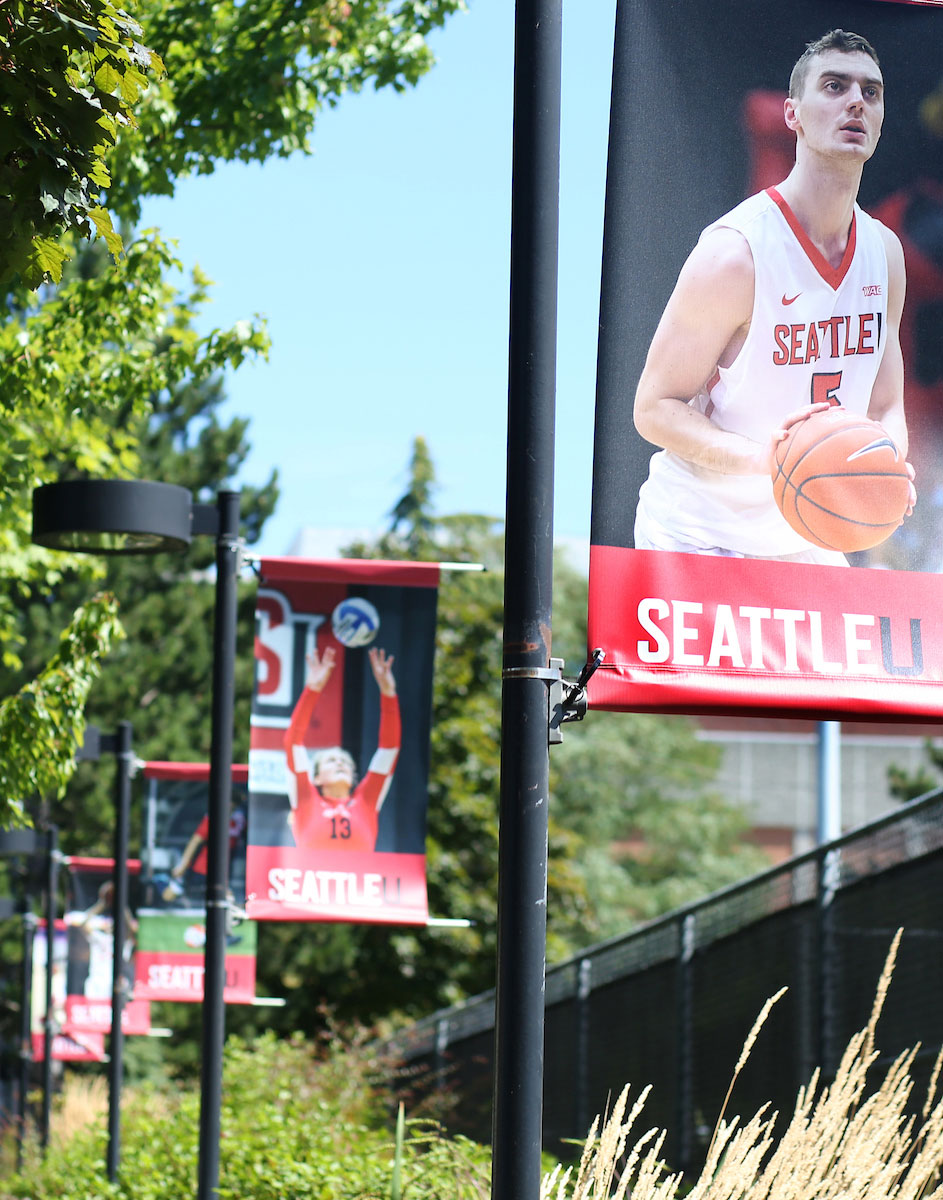 Street banners along Cherry Street showcasing SU Athletics