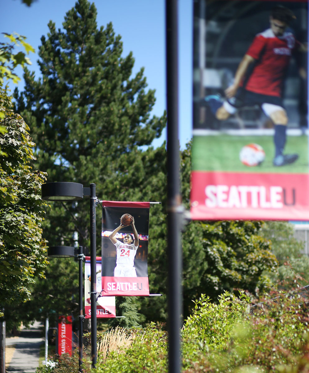 Street banners along Cherry Street showcasing SU Athletics